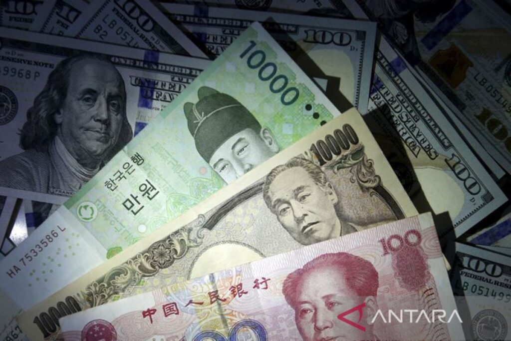 Dolar melorot di Asia saat Fed batalkan kenaikan suku bunga